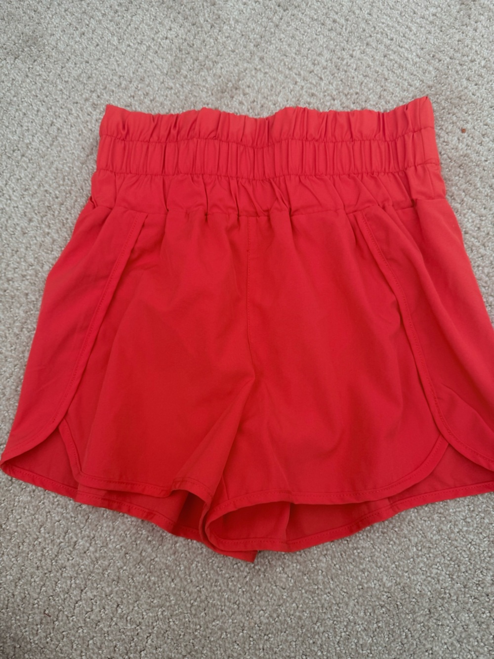 Bright orange athletic shorts